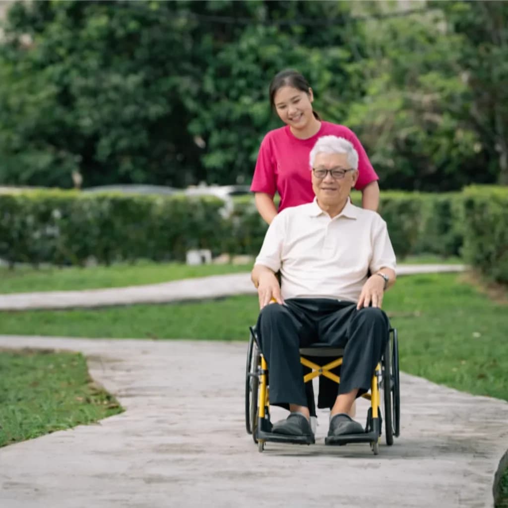 Caregiver assisting elderly person